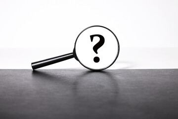 Magnifying glass and a question mark, Question concept.what next.