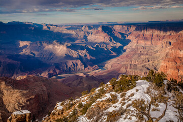 View of the Grand Canyon and coilorado river with snow in the foreground, from the south rim, Grand Canyon National Park, Arizona.