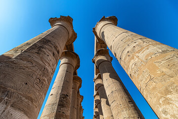Columns in The Luxor Temple, a large Ancient Egyptian temple complex located on the east bank of...