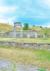View of ancient ruins and columns on the hills