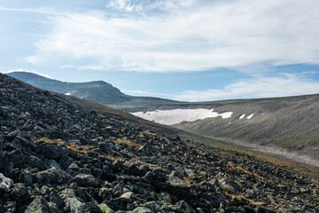 The concept of outdoor activities in the mountains. Minimalist mountain landscape. Atmospheric view. The majestic nature of the Circumpolar Urals.
