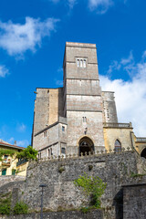 Fototapeta na wymiar View of the 13th century Gothic church of San Pedro de Zumaia, Basque Country, Spain, with blue sky, vertically