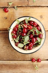 Ripe red cherries in a bowl macro