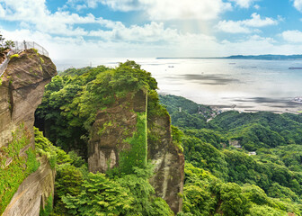 Fototapeta premium Cliffs of the ancient stone quarry of mount Nokogiri with an observatory jutting out over the void on a stunning panoramic vantage point overlooking the Boso Peninsula.