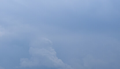 The stormy beauty of the blue Cumulus clouds in summer