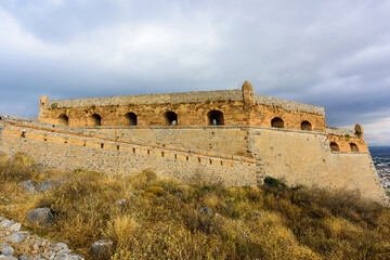 Bastions and structures in the fortress of Palamidi and view of city of Nafplion,Greece
