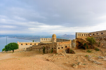Bastions and structures in the fortress of Palamidi and view of city of Nafplion,Greece