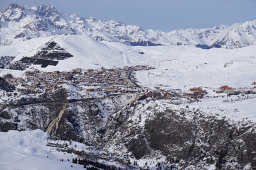panoramic view of a french ski resort in the alps from the slopes