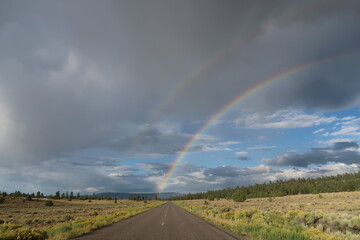 double rainbow over the road