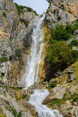 Fototapeta na wymiar Waterfalls of Tzoumerka. One of two picturesque waterfalls in the mountains of a national park in eastern Tzoumerka, in the vicinity of the village of Kriopigi. Greece