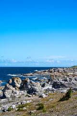 Fototapeta na wymiar Limestone stacks on the coast of the island of Faro in Sweden