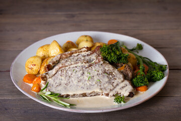 Beef steak fillets with creamy Gorgonzola cheese dressing