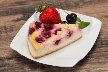 Cheesecake with cherry served strawberry