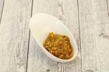 Green spicy sauce in the bowl