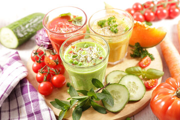 fresh vegetable soup on wood background