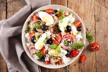 rice salad with egg, tomato, onion, olive