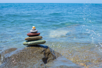 Stack of zen stones near sea. Harmony, balance