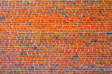 The background of the old red brick wall for design interior and  various scenes or as a background for video interviews.