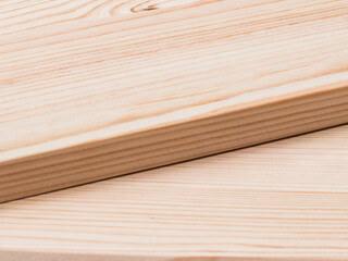 Close-up of blank planks lying diagonally. Wooden texture.