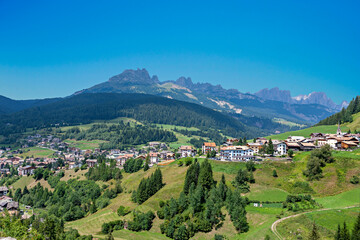 Italy, Dolomites, the Moena village and in the background the Catinaccio mountain