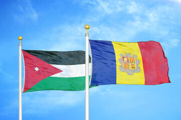 Jordan and Andorra  two flags on flagpoles and blue cloudy sky