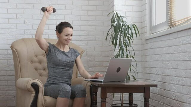 Exercises with dumbbells at home.