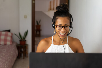 Young brazilian woman working from home
