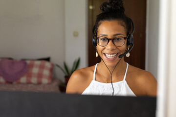 Young brazilian woman working from home