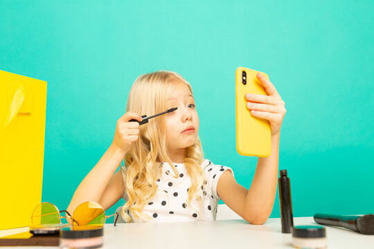 Little Girl Doing Makeup On Camera For Vlog. Working As Blogger, Recording Video Tutorial For Internet