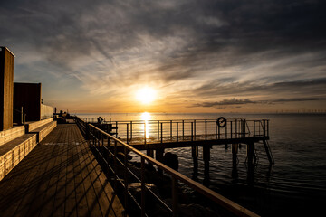 Obraz na płótnie Canvas Sunset over the pier