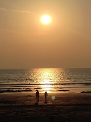 silhouette of a couple on the beach