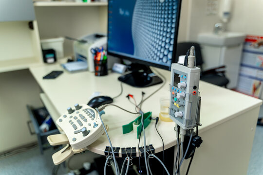 Electromyography equipment. Cropped photo. Medical examination. EMG in modern office.