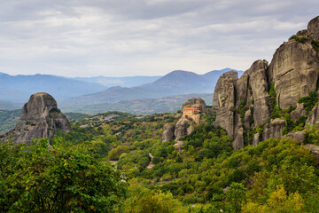 Fototapeta na wymiar View of the Holy Monastery of Saint Nicholas Anapafsas at Meteora included in UNESCO-listed monastery complex and mountain formations in Meteora, Greece