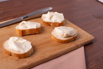 Fototapeta na wymiar mini sandwiches with creamy cheese