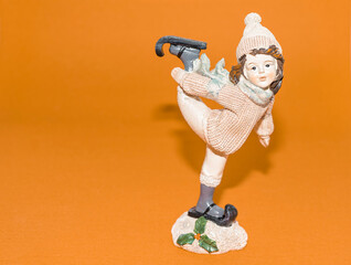 Statuette of a figure skater on ice. Statuette of a girl on skates
