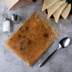 Restaurant mushroom soup packed in a plastic bag for delivery