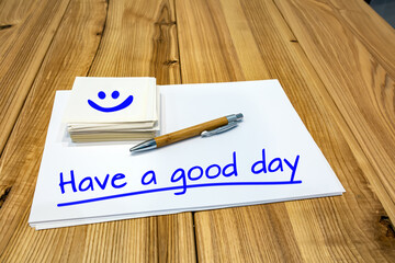 Have a nice day, the inscription on the sheets of white paper