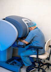 Surgeon in hospital with robotic technology equipment. Closeup of neurosurgery machine.