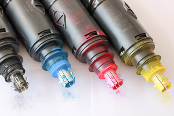 Toner cartridge set for color laser printer. Equipment for printingon white background