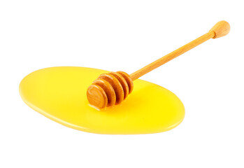 sweet honey drips from a wooden spoon  isolated on white background. Horizontal composition.