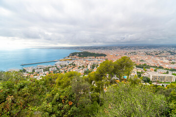 Fototapeta na wymiar View from the Mont Boron lookout over the old city, Mediterranean Sea, port and Castle Hill on the Riviera coast of Southern France