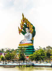 Big Buddha Statue at Wat Daeng Thammachat. Buddhist Temple on Chao Phraya River in Bangkok, Thailand.