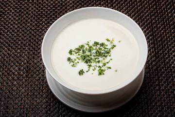 fresh buttermilk soup with parsley on top