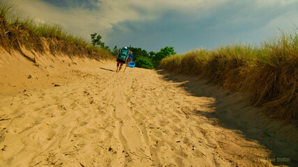 woman walking on the beach at Indiana Dunes National lake-shore 