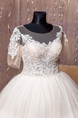 Fototapeta na wymiar white wedding dress on a mannequin