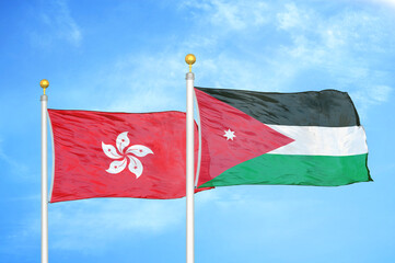 Naklejka na ściany i meble Hong Kong and Jordan two flags on flagpoles and blue cloudy sky