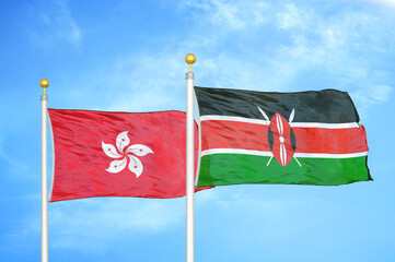 Hong Kong and Kenya two flags on flagpoles and blue cloudy sky