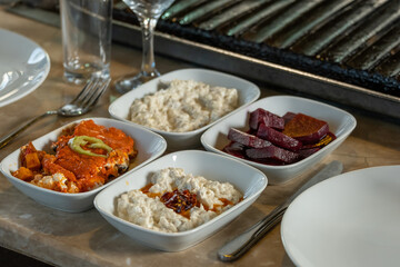 Different types of meat grilled on Barbecue on the table, Served with special Turkish appetizers and Turkish raki