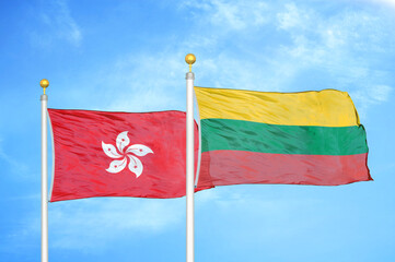 Hong Kong and Lithuania two flags on flagpoles and blue cloudy sky