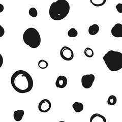 Doodle circles seamless pattern. Black dots texture background.